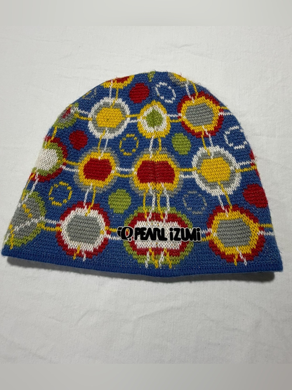 Pearl Izumi Kids Blue Knit Beanie with Multicolor Circles